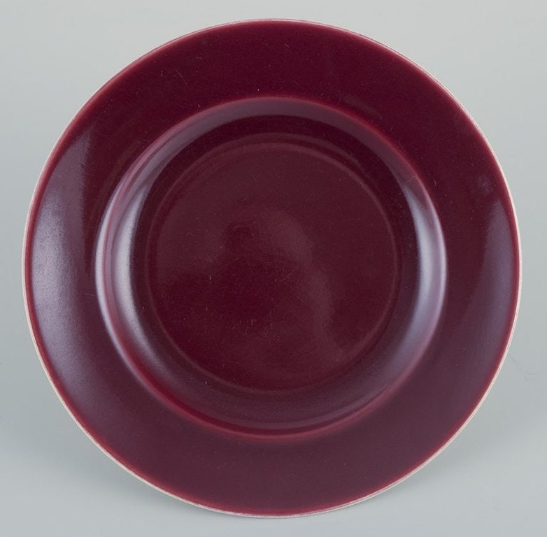 Aluminia, Denmark. Eight 'Confetti' plates in glazed earthenware. Different colours. Mid 20th - 2
