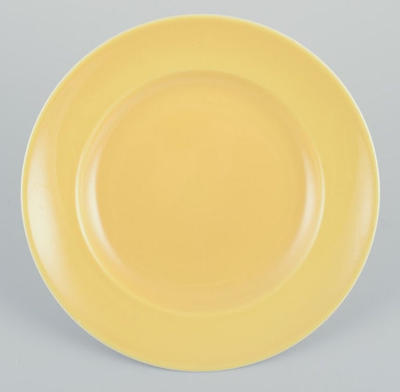 Aluminia, Denmark. Eight 'Confetti' plates in glazed earthenware. Different colours. Mid 20th - 3