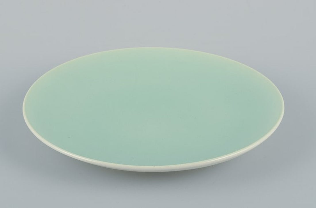 Alumina, Denmark. Four 'Confetti' plates in mint green glazed earthenware. Mid 20th century. - 2