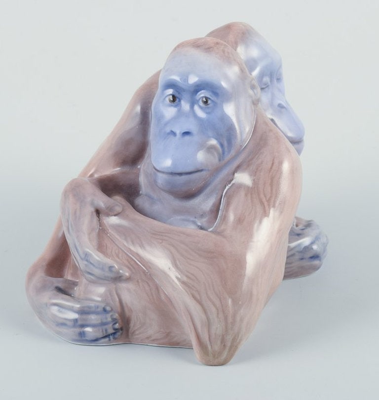 Knud Kyhn for Royal Copenhagen. Rare porcelain figurine of two orangutans. Dated early 1900s. - 2