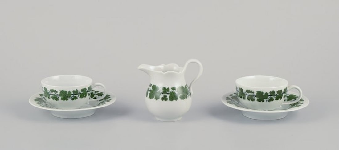 Meissen, Germany. 'Green Ivy Vine' two coffee cups with matching saucers and a creamer. 1920s/30s. (1 of 7)
