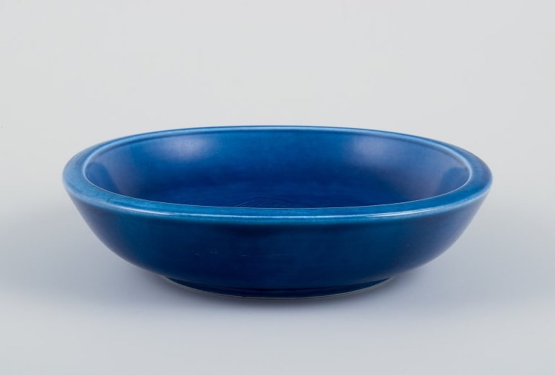 Nils Thorsson for Aluminia, Denmark. Faience bowl with blue glazed finish. Featuring a fish motif. - 2