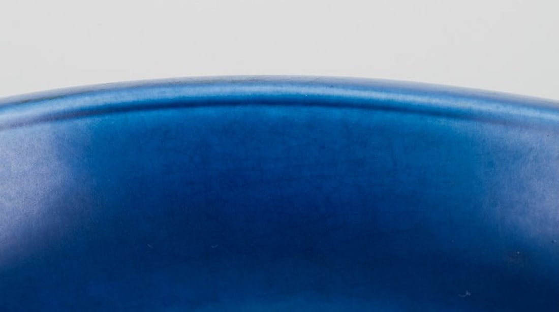 Nils Thorsson for Aluminia, Denmark. Faience bowl with blue glazed finish. Featuring a fish motif. - 7