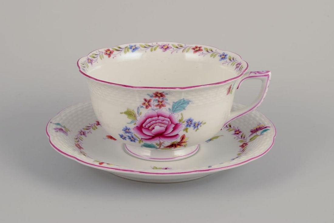 Herend, four pairs of large porcelain teacups & saucers with floral motifs. Dated 1944. - 2