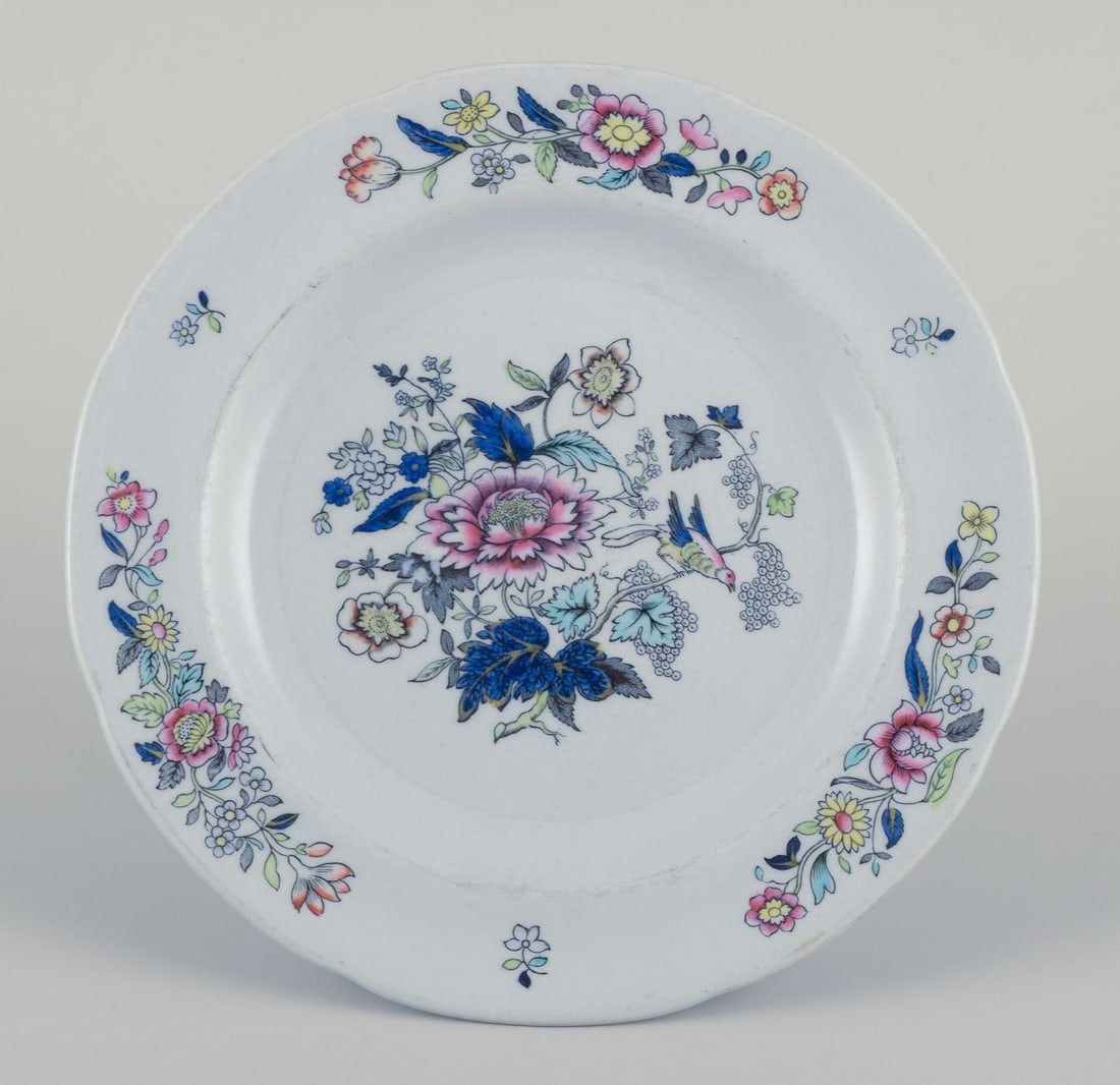 Copeland Spode, England. Nine plates in faience with flower and bird motifs. Approx. 1930s. - 2