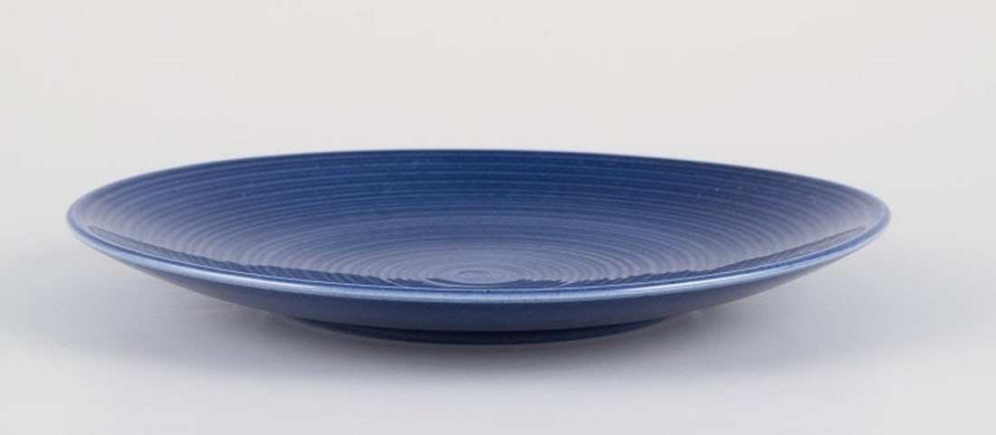 Gertrud Lonegren for Rorstrand, Sweden. Set of twelve 'Blå Blanche' plates in faience. Circa - 2