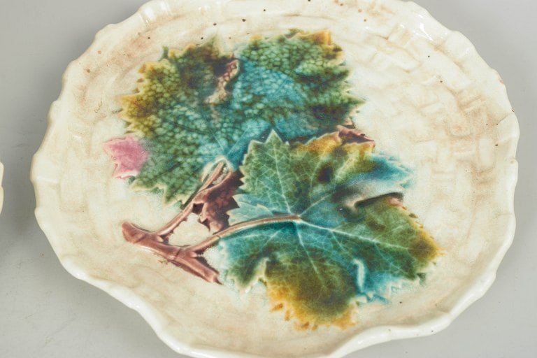 Gustavsberg, Sweden. Majolica set of seven plates with relief moulded and floral decoration . Circa - 3