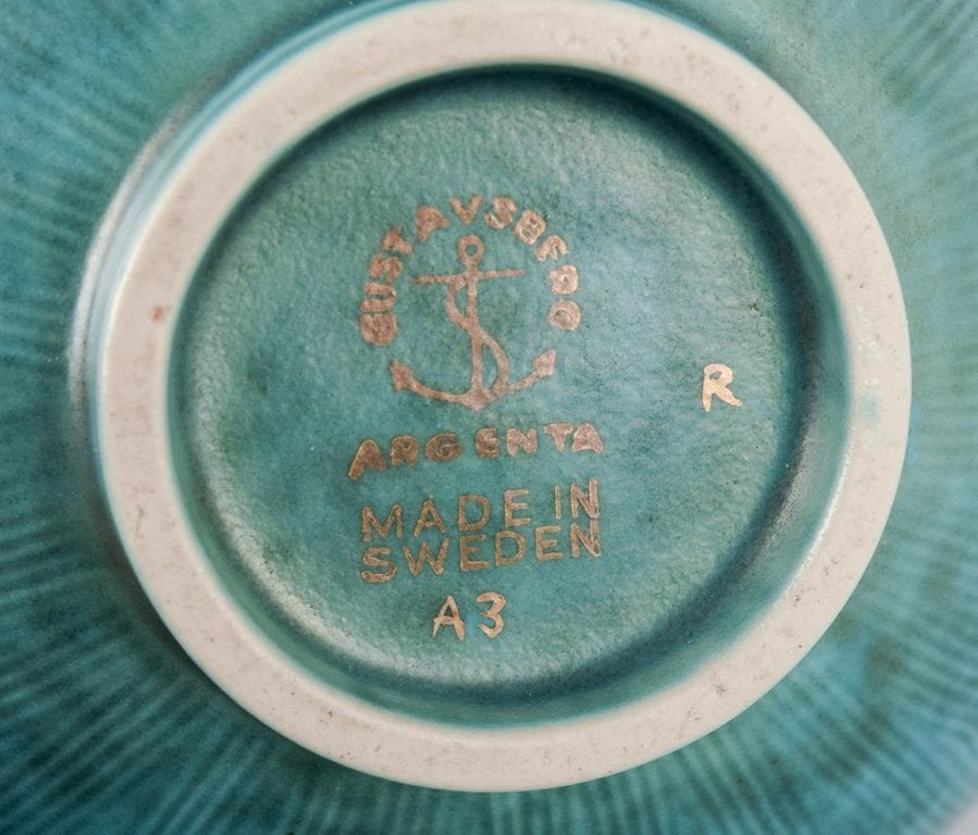 Wilhelm Kåge for Gustavsberg, Sweden. Three small ceramic bowls from the 'Argenta' series. Mid - 7