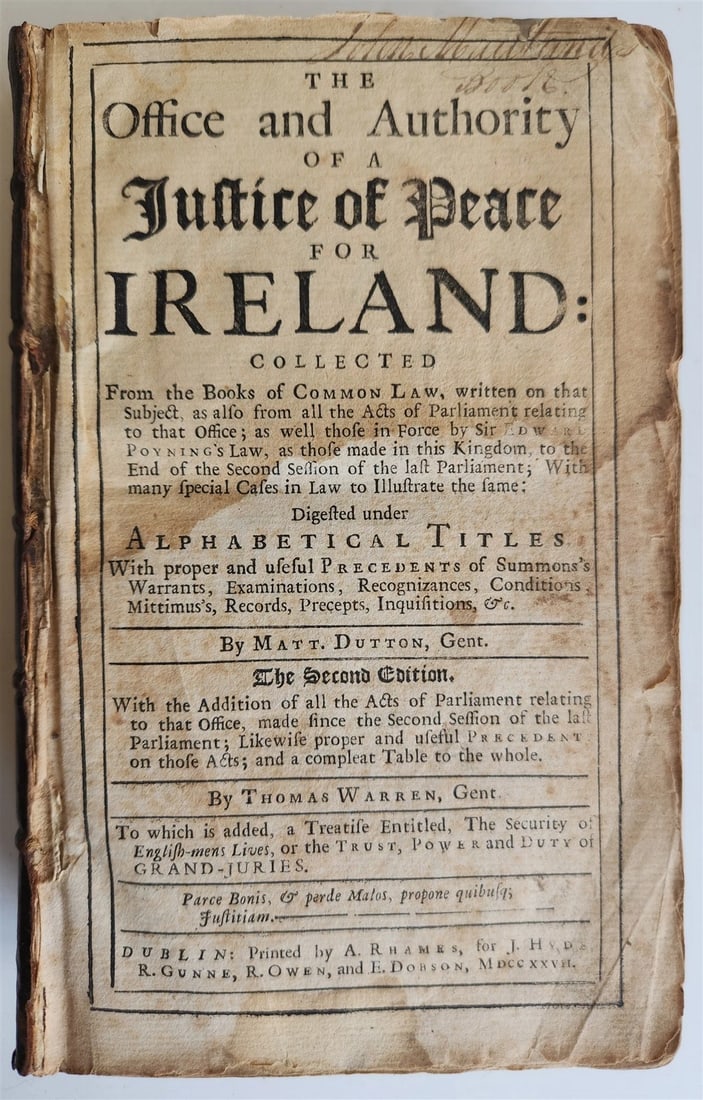 1727 LAW BOOK in ENGLISH Office & Authority of Justice of Peace for Ireland: Dutton, Matthew. The Office and Authority of a Justice of Peace for Ireland... Second Edition. Bound with: The security of English-Mens lives Dublin, 1727 Original calf; lacking front cover, rear cove
