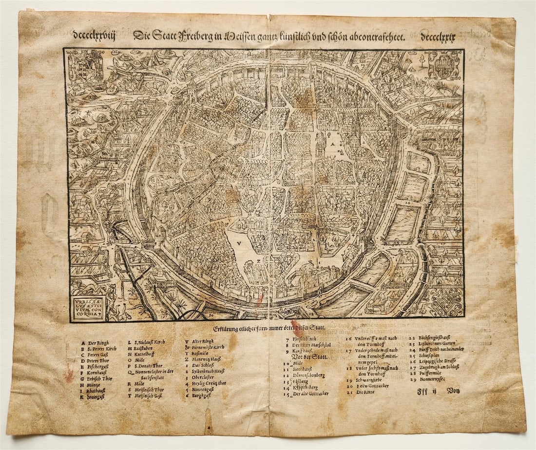 1572 MAP of FREYBERG GERMANY from SEBASTIAN MUNSTER'S COSMOGRAPHY antique: 1572 woodcut MAP of FREYBERG, GERMANY from SEBASTIAN MUNSTER'S "COSMOGRAPHY" Size 12 1/4 by 15 inches Double-sided Worn, repaired tears at the margins Text in German Reserve: $98.00 Shipping:<