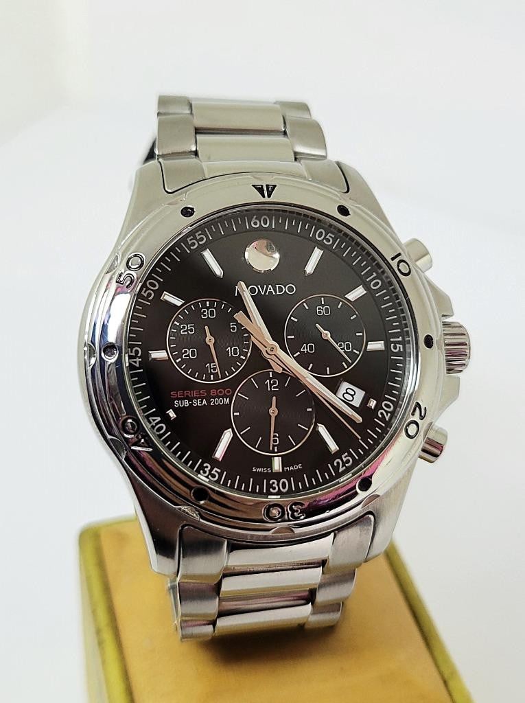 S/Steel MOVADO Chronograph SERIES 800 Watch 42 mm Black Dial Quartz 14.1.14 1060: Steel MOVADO Chronograph SERIES 800 Watch 42 mm Black Dial Quartz 14.1.14 1060? EXLNT?? This Mens Movado watch is Swiss made. Great present for yourself or someone you love! * Stainless steel case,