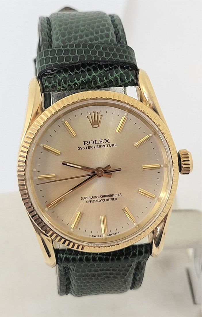 Vintage 14k ROLEX Oyster Perpetual Chronometer Automatic Watch c.1960 Ref.1011: Vintage Solid 14k ROLEX Oyster Perpetual Chronometer Automatic Watch c.1950s Ref.1011 in EXCELLENT Condition* SERVICED This Men's Rolex watch is Swiss made. Great present for yourself or someone you l