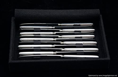 A collection of 9 pieces of various plated silver. Among other things, cake spatulas, food pushers, - 7