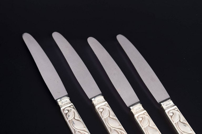 Evald Nielsen, Denmark. Set of four fruit knives in sterling silver and stainless steel. Approx. - 3