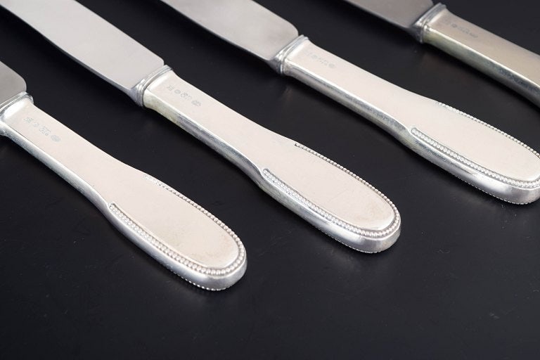 Evald Nielsen, Denmark. Set of four dinner knives in sterling silver and stainless steel. Approx. - 3