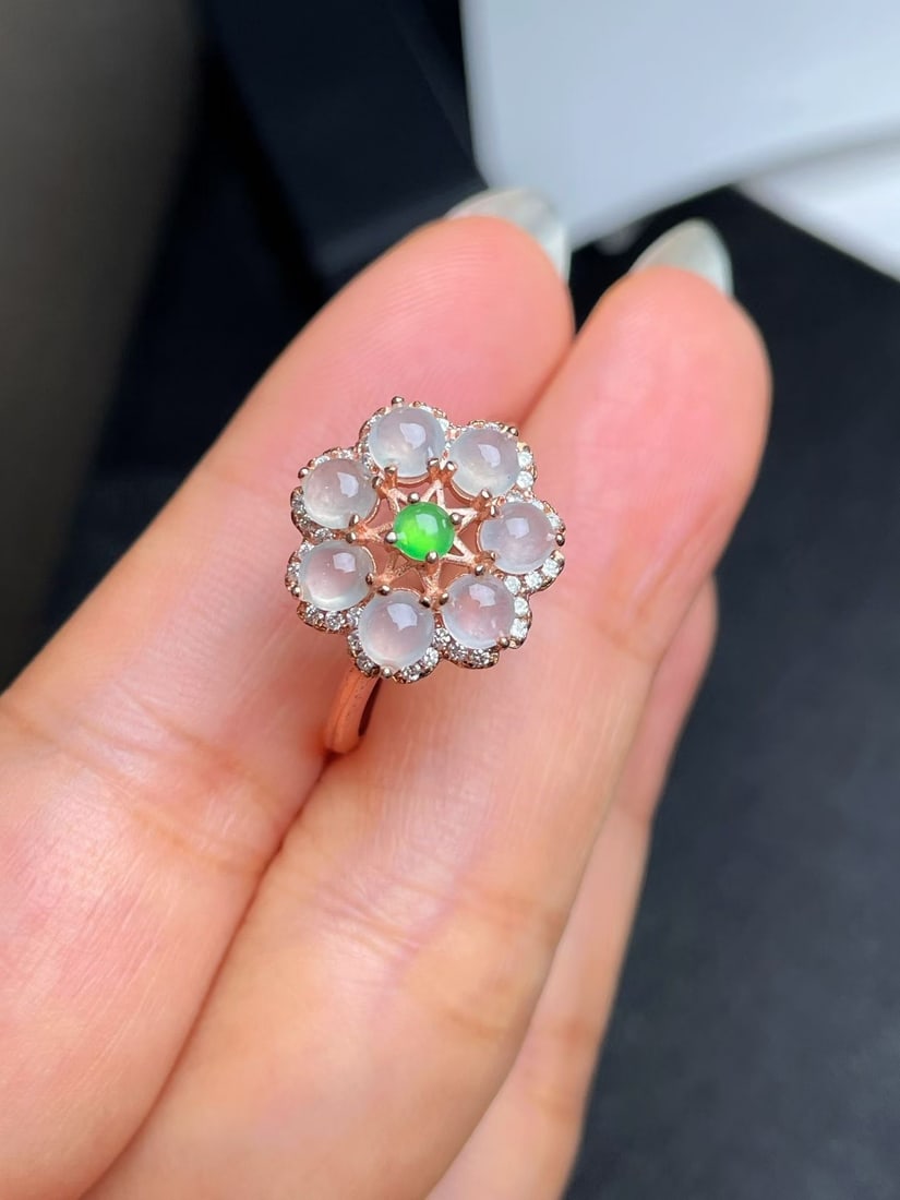 Silver Icy Green Jadeite Ring: Title: Silver Icy Green Jadeite Ring Description: This jadeite ring showcases a refreshing icy green hue, with a translucent texture that captivates. Each jadeite piece is carefully selected, presenti