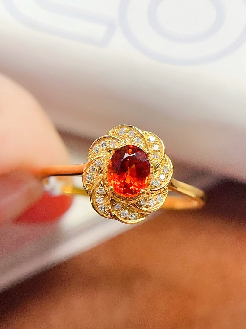 18K Gold Fanta Ring: Title: 18K Gold Fanta Ring Description: This ring is crafted in 18K gold, showcasing the unique charm of the Fanta gemstone. The glassy luster complements its brilliant and vibrant color, elegant as a
