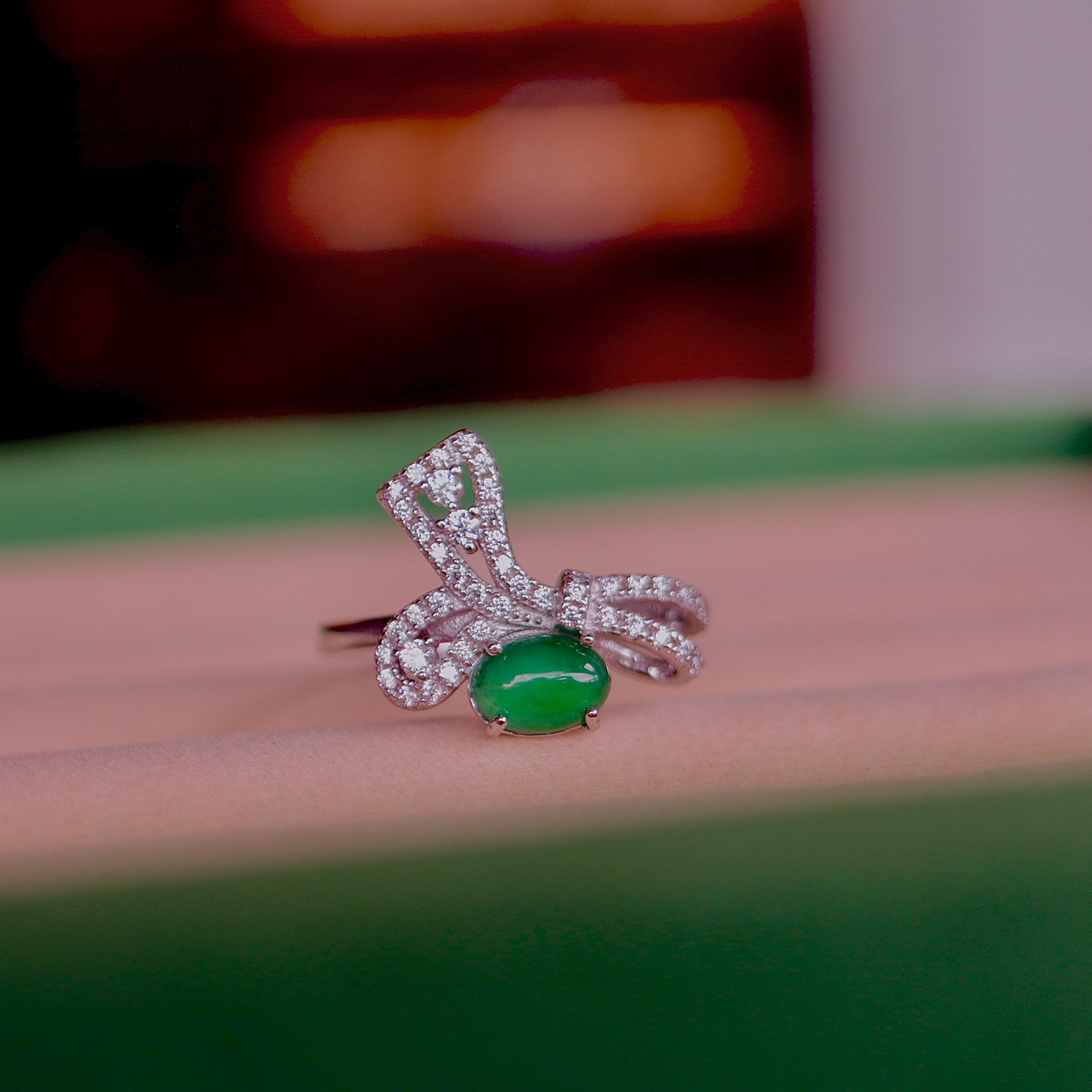 Natural Jadeite Ring: Title: Natural Jadeite Ring Description: This ring features a natural jadeite as the main stone, showcasing an elegant egg-shaped design. Set in S925 sterling silver, the jadeite exhibits a vibrant gr