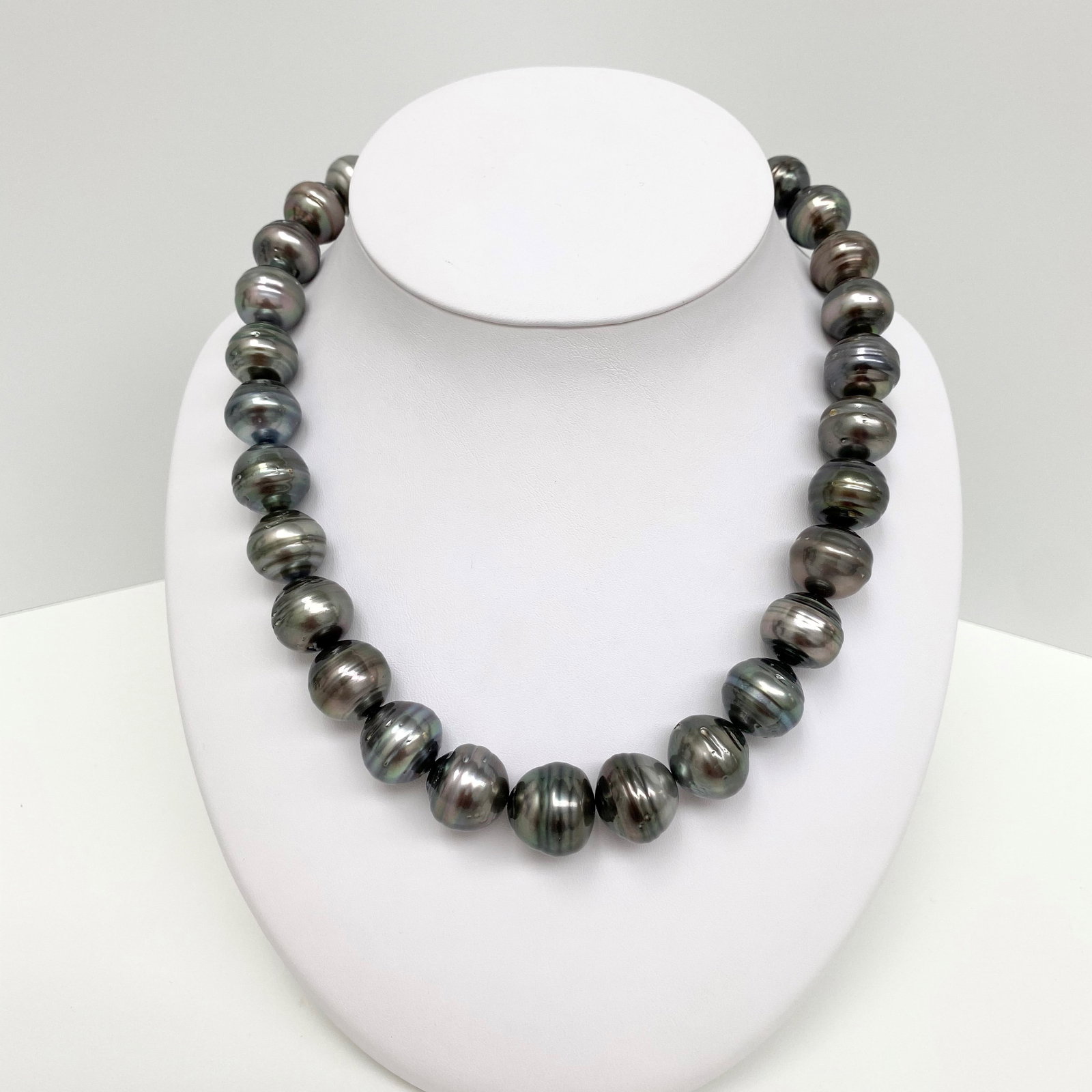 15-17mm Tahitian Circled Button/Baroque Pearl Necklace with 14k Clasp: Title:15-17mm Tahitian Circled Button/Baroque Pearl Necklace with 14k Clasp Description:Medium Green Tahitian Circled Button/Baroque Large Size Pearl Necklace, 29 pearl pieces, 18 inches hand-knotted