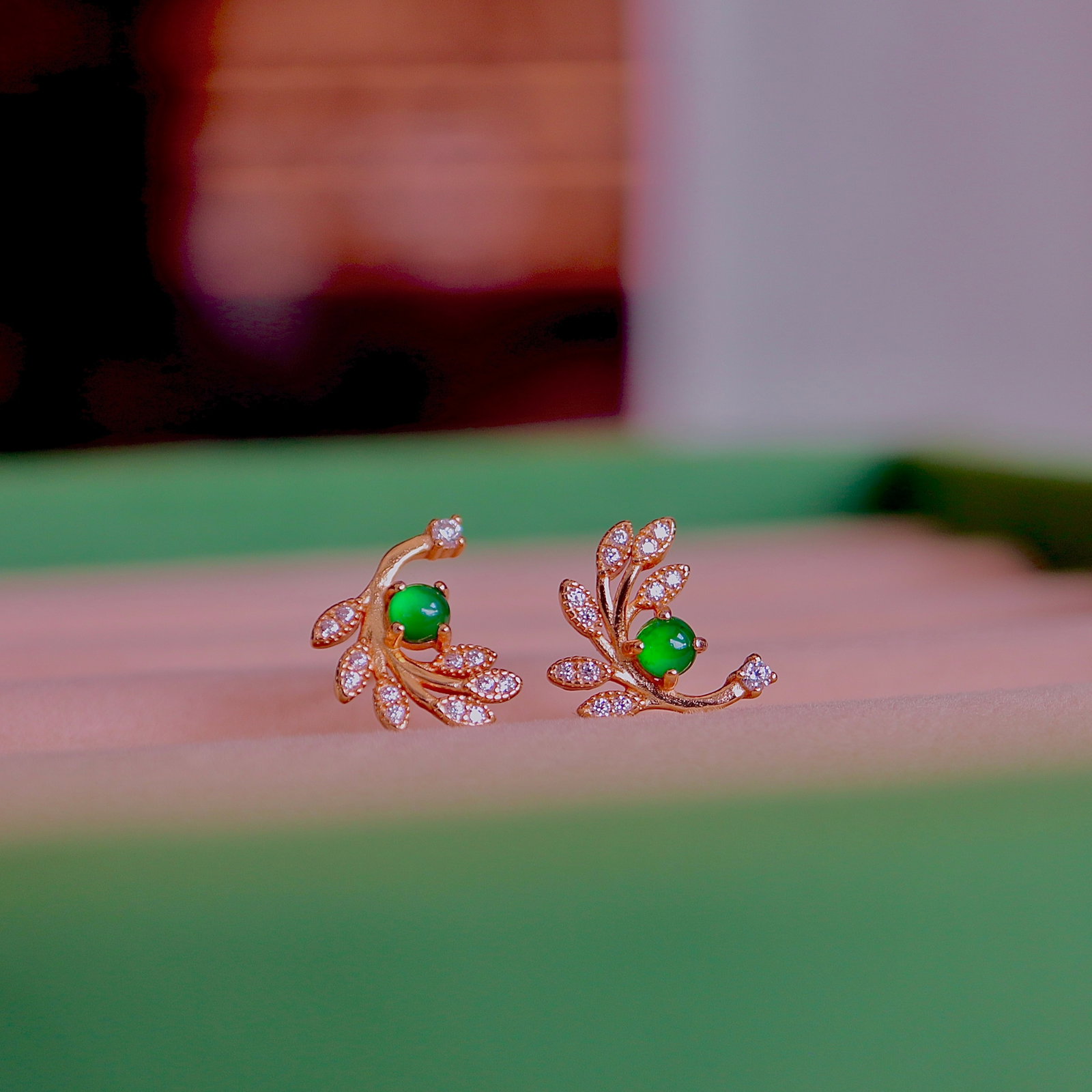 S925 Silver Natural Jade Earrings: Title: S925 Silver Natural Jade Earrings Description: These earrings are meticulously set in S925 silver, showcasing the high icy green hue of the jade, resembling vibrant leaves. The fine texture of