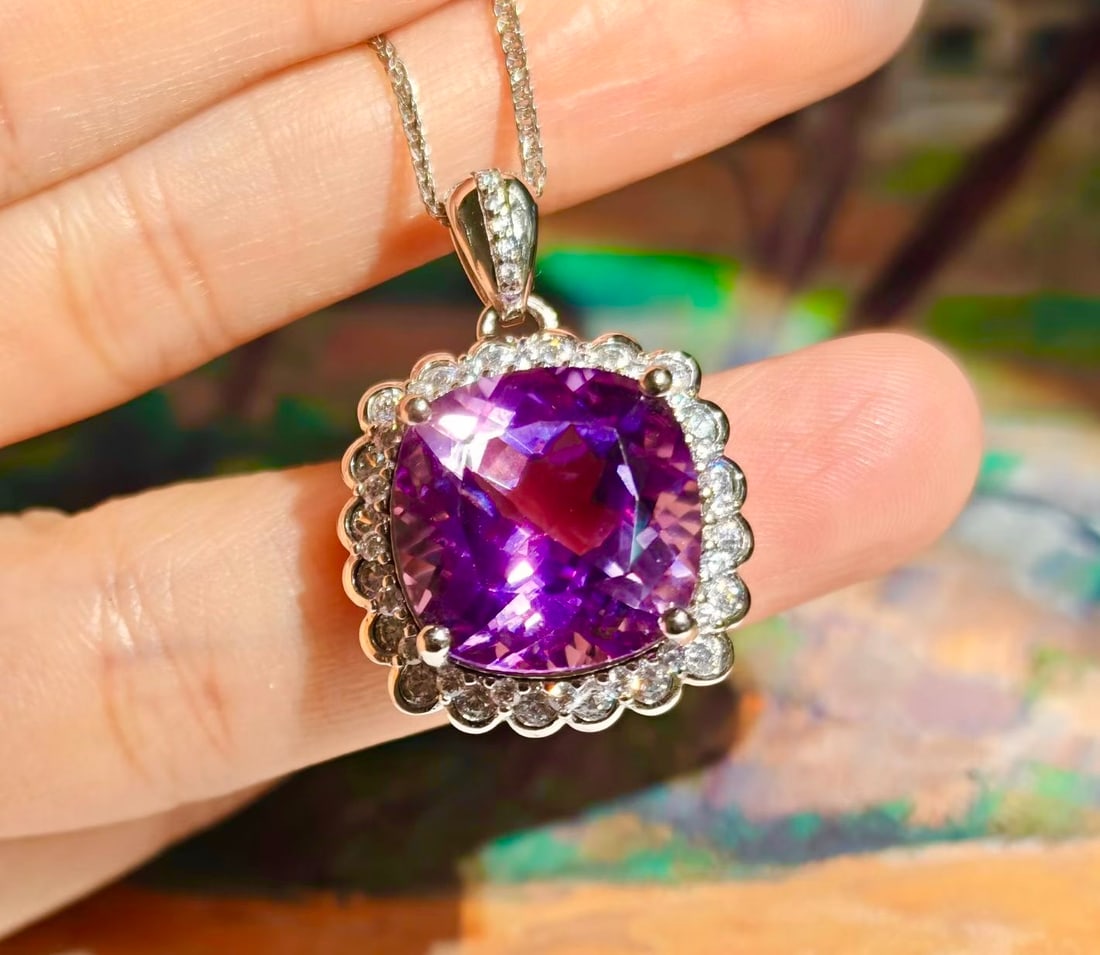 925 Silver Natural Amethyst Pendant: Title: 925 Silver Natural Amethyst Pendant Description: This pendant is meticulously crafted in 925 silver, set with a natural amethyst, exuding a noble and elegant aura. The amethyst's deep and encha