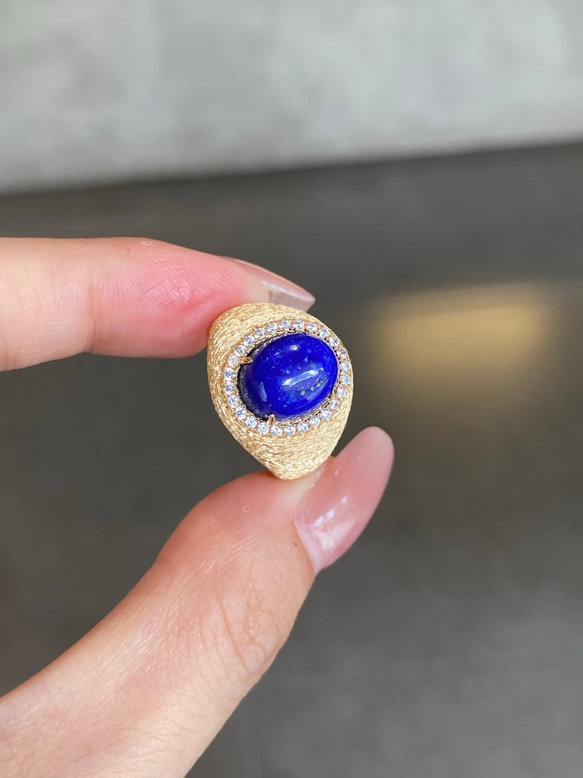 Lapis Lazuli Ring: Title: Lapis Lazuli Ring Description: This ring features lapis lazuli as the main stone, showcasing a classic vintage signet style. The design combines modern craftsmanship with traditional