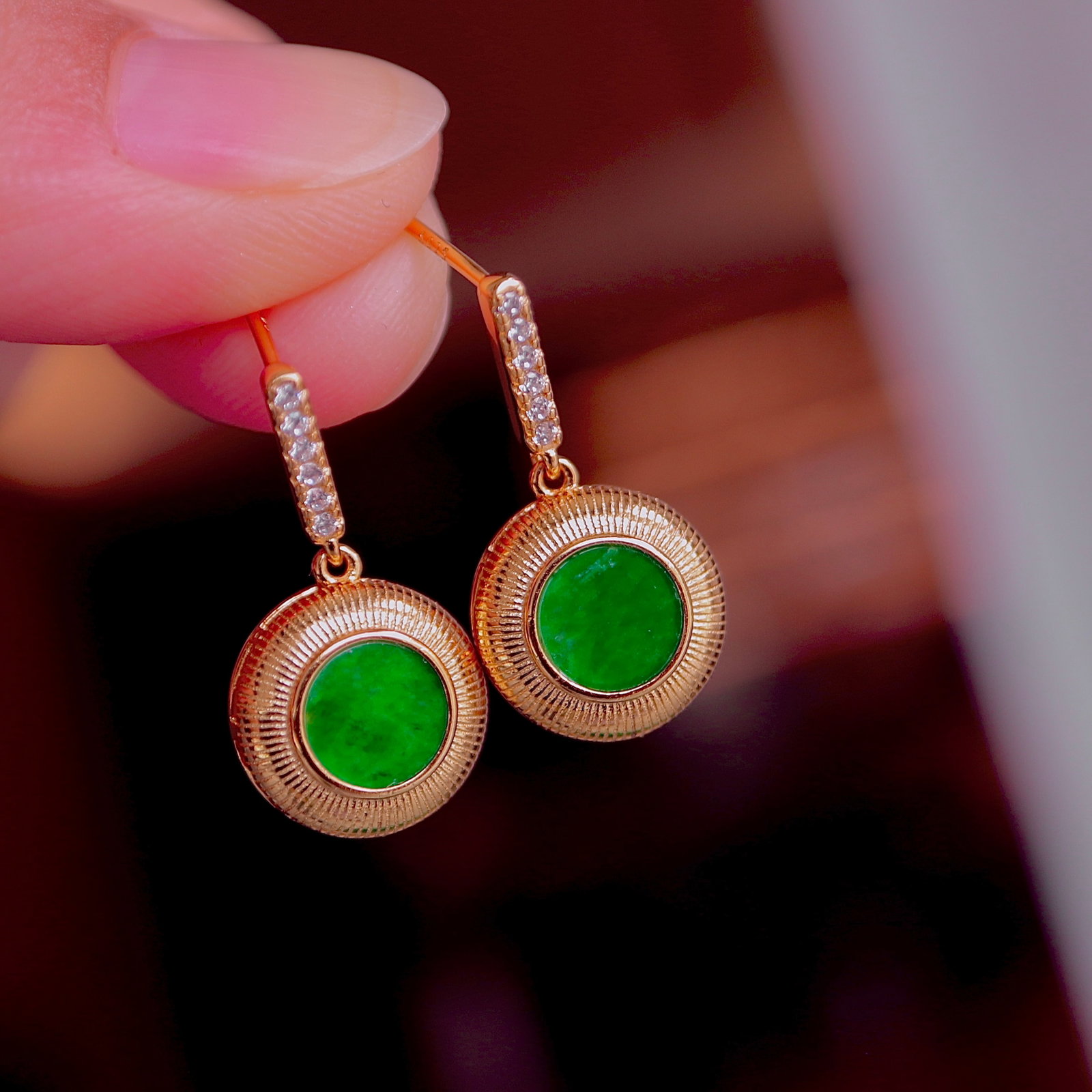 Natural Jadeite Stud Earrings: Title: Natural Jadeite Stud Earrings Description: These stud earrings feature natural jadeite as the main stone, showcasing a classic round design. Set in S925 sterling silver, the overall look is