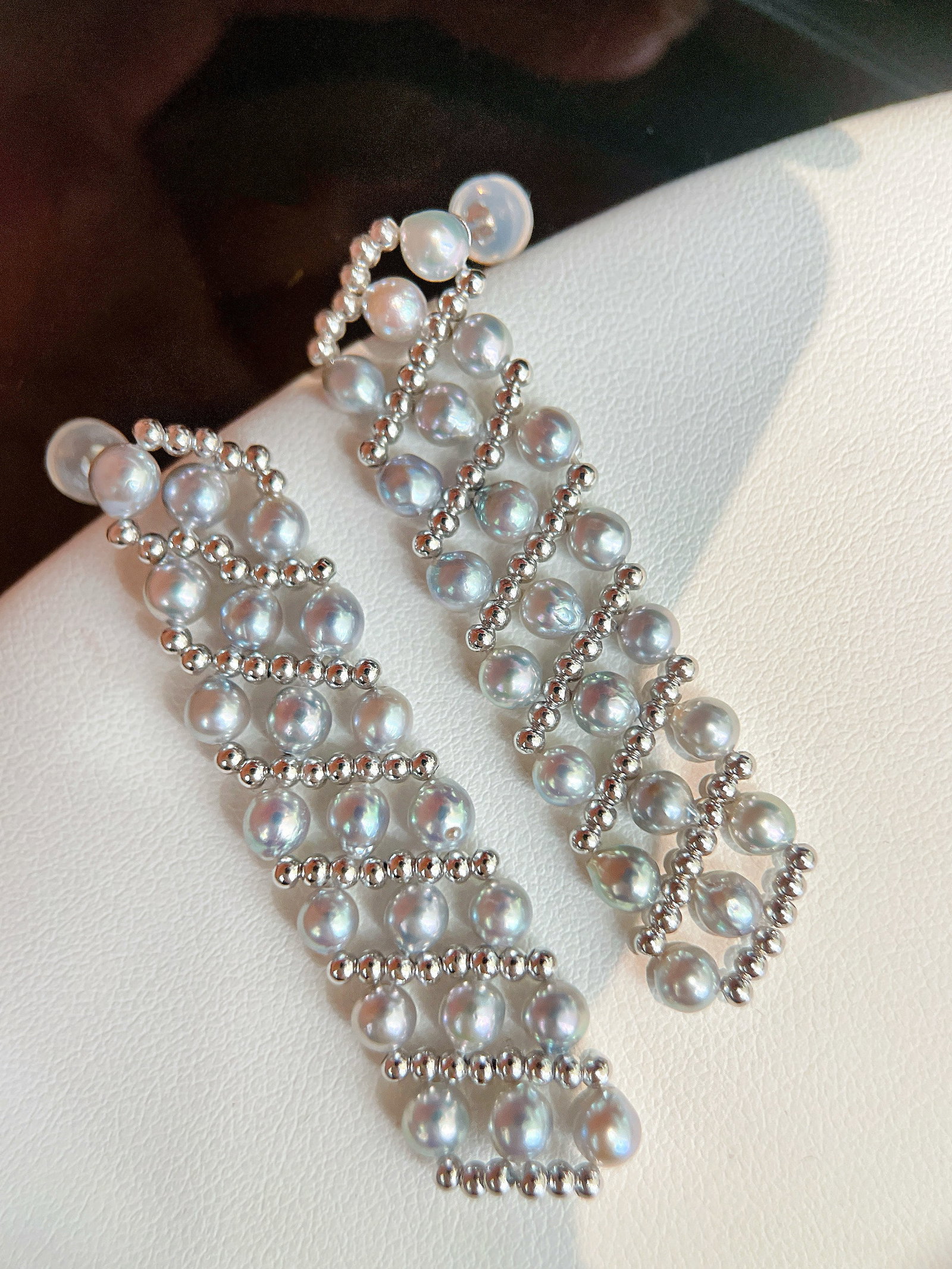 925 Silver Natural Pearl Earrings: Title: 925 Silver Natural Pearl Earrings Description: These earrings are crafted with French hand-woven techniques, showcasing the understated and classic beauty of natural pearls. The aurora gray