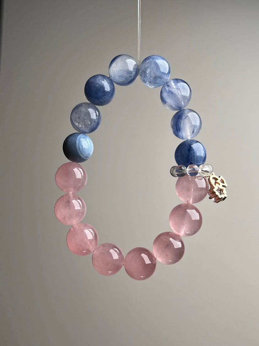 Natural Kyanite Multi-Gem Bracelet: Title: Natural Kyanite Multi-Gem Bracelet Description: This bracelet features natural kyanite as the main stone, complemented by other precious gems, showcasing an elegant blue and pink color scheme.
