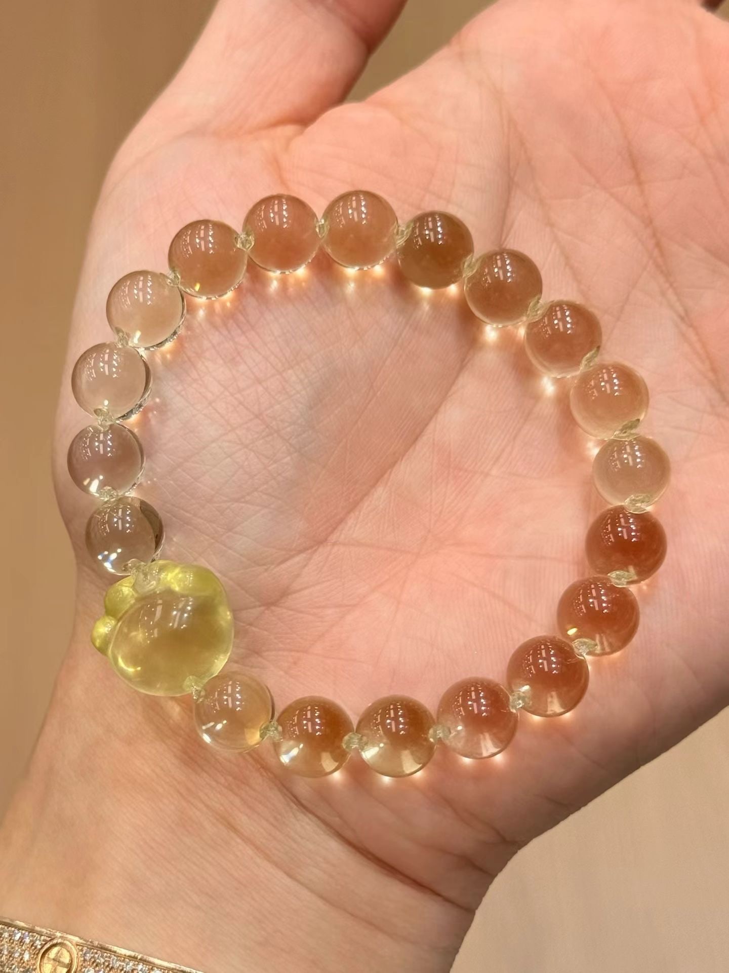 Lemon Yellow Crystal Bracelet: Title: Lemon Yellow Crystal Bracelet Description: This bracelet captivates with its bright lemon yellow crystal beads, each approximately 9mm in diameter, exuding a fresh and elegant aura. Each crysta