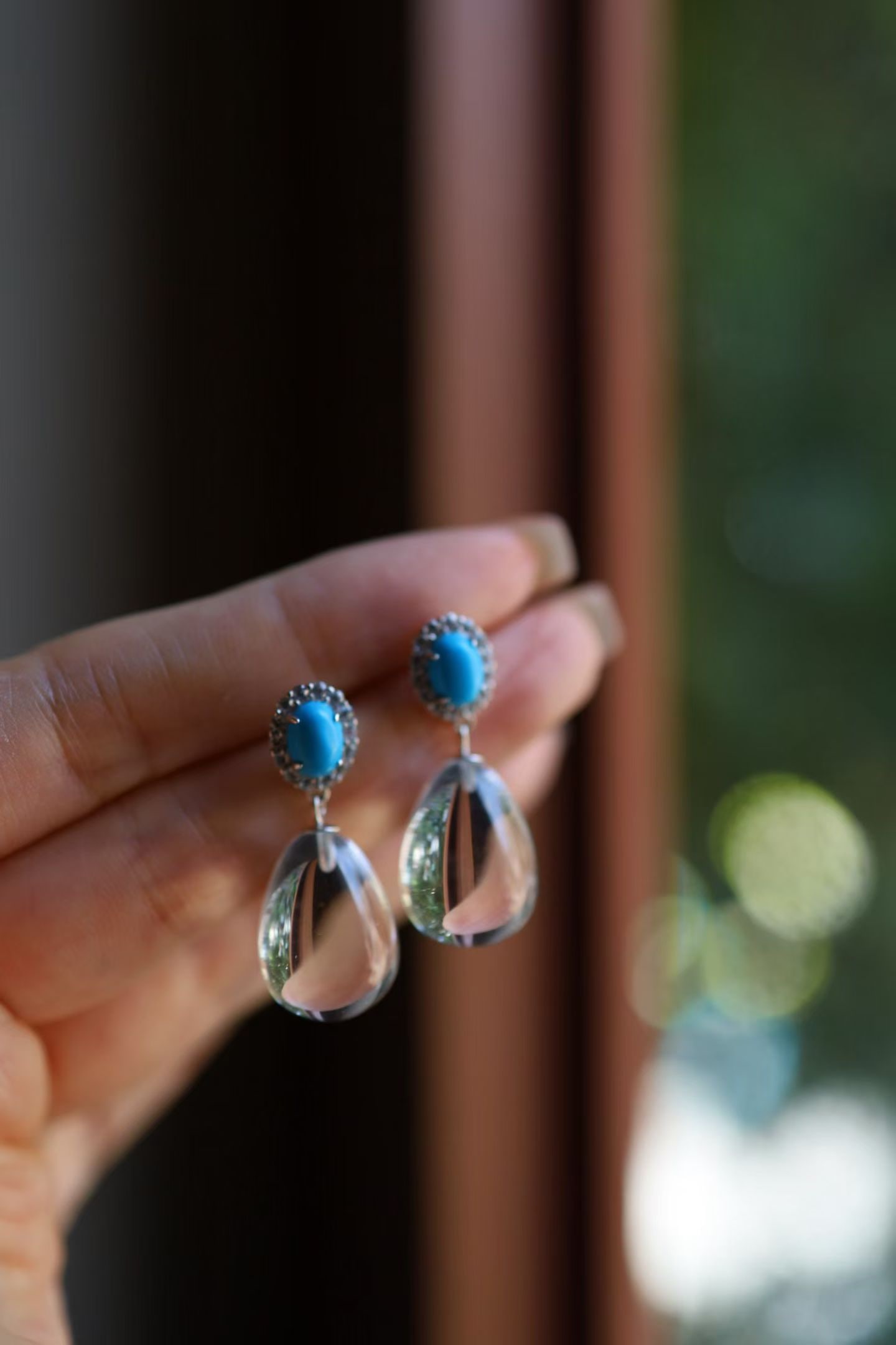 Sterling Silver Natural White Crystal Earrings: Title: Sterling Silver Natural White Crystal Earrings Description: These earrings feature natural white crystal as the main stone, paired with sterling silver, showcasing a simple and elegant design. 