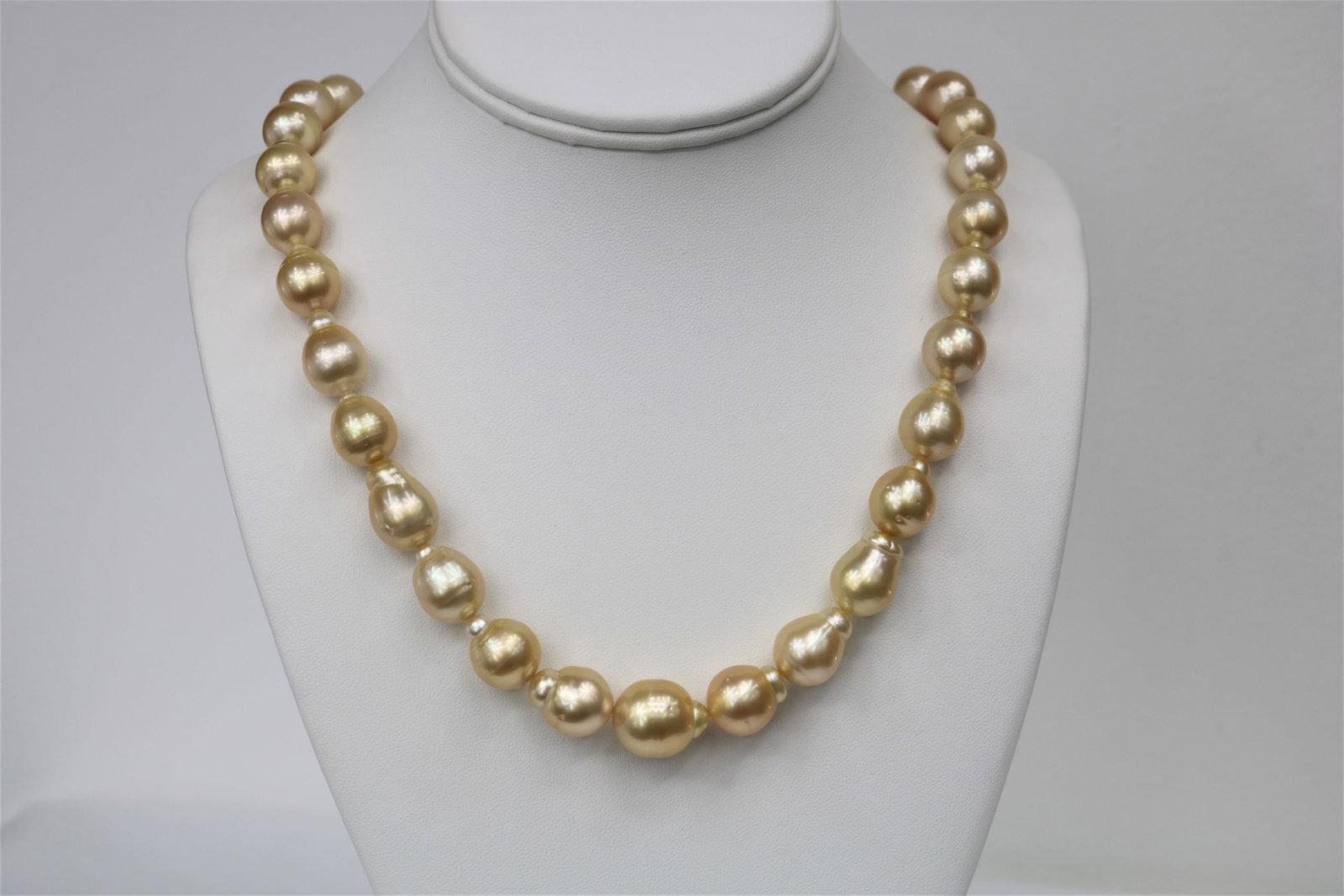 12-14mm Golden Drop/Baroque Necklace with 14k Clasp: Title:12-14mm Golden Drop/Baroque Necklace with 14k Clasp Description:AAA Luster, Golden Drop/Baroque Big Size Necklace from Philipines, 25 pearl pieces, 18 inches hand knotted with 14k YG fish-hook