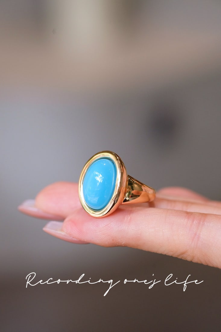 18K Gold Turquoise Ring: Title: 18K Gold Turquoise Ring Description: This ring has undergone multiple revisions to achieve a perfect effect. The turquoise's hue complements the luster of 18K gold, exuding elegance and