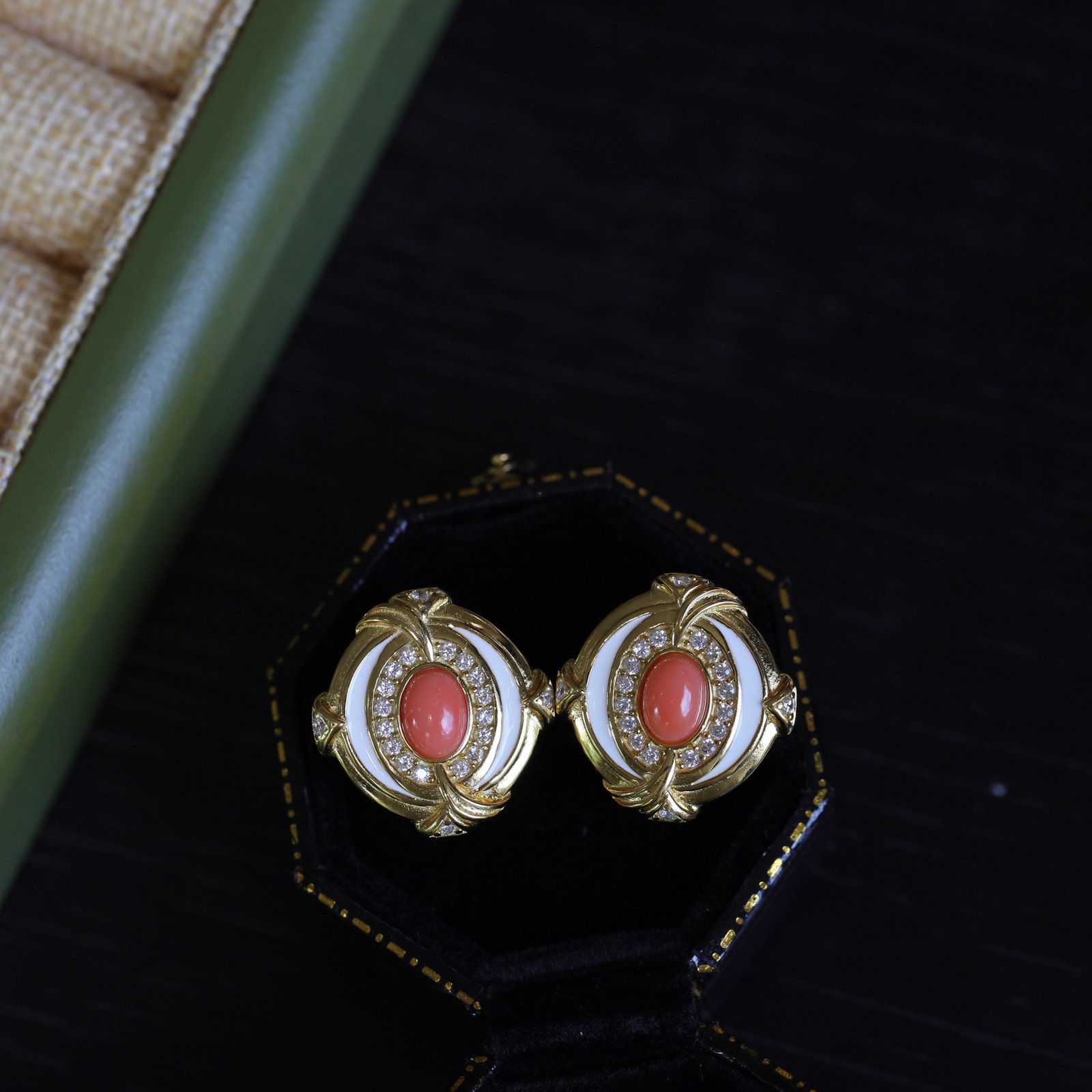 S925 Silver Natural Pink Coral Earrings: Title: S925 Silver Natural Pink Coral Earrings Description: The natural pink coral main stone is exquisitely set in a vintage frame of gilding and white enamel, surrounded by delicate diamond accents.