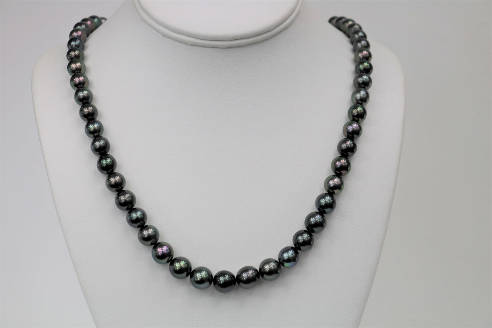 8-10mm Tahitian Round Peacock Necklace with 14k Clasp: Title:8-10mm Tahitian Round Peacock Necklace with 14k Clasp Description:AAA Luster, Tahitian Round/Near Round Peacock Necklace, 43 pearl pieces, 18 inches hand knotted with 14k fish-hook clasp