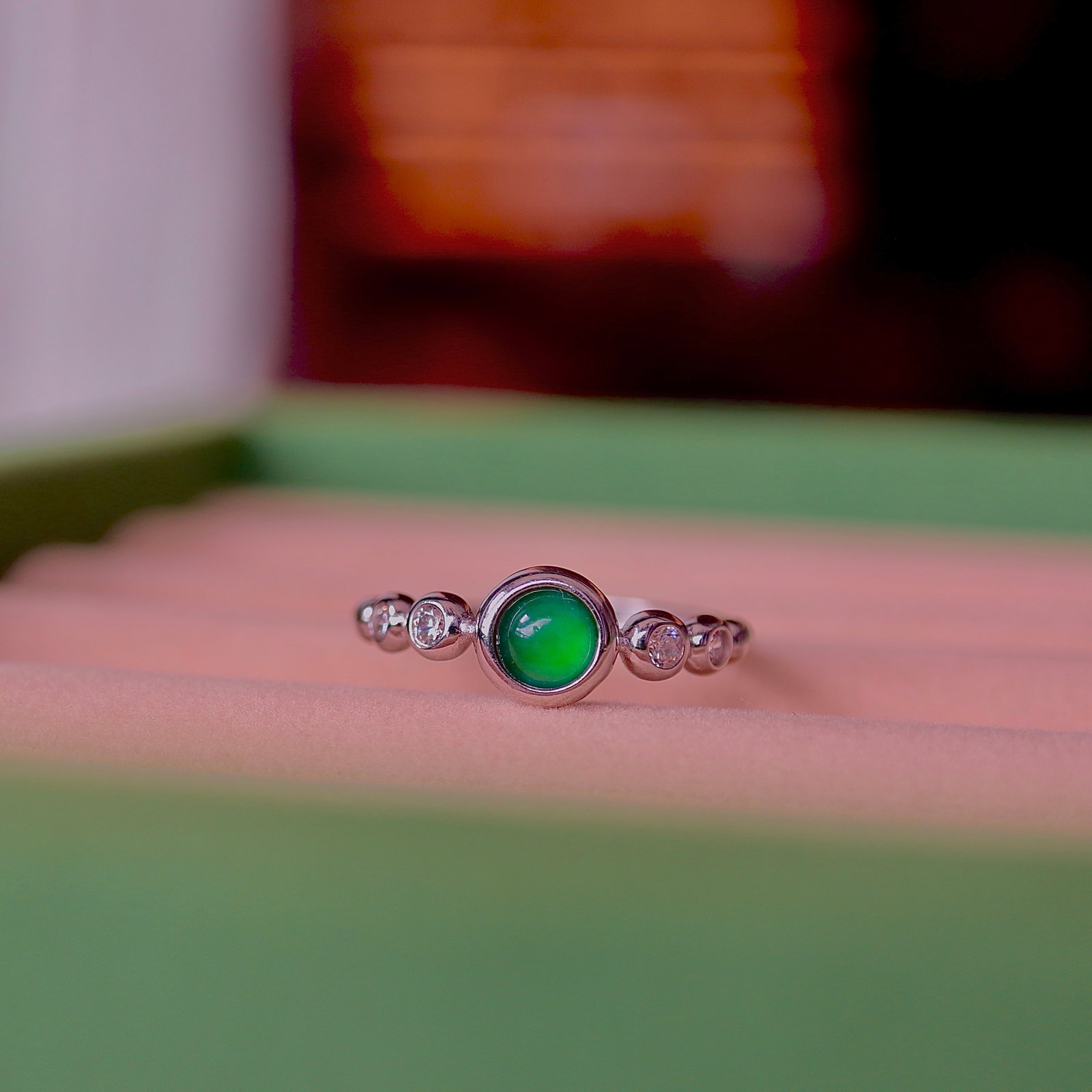 S925 Silver Natural Jadeite Ring: Title: S925 Silver Natural Jadeite Ring Description: This ring is meticulously set in S925 silver, showcasing the elegance and simplicity of natural jadeite. The delicate texture of the jadeite comple