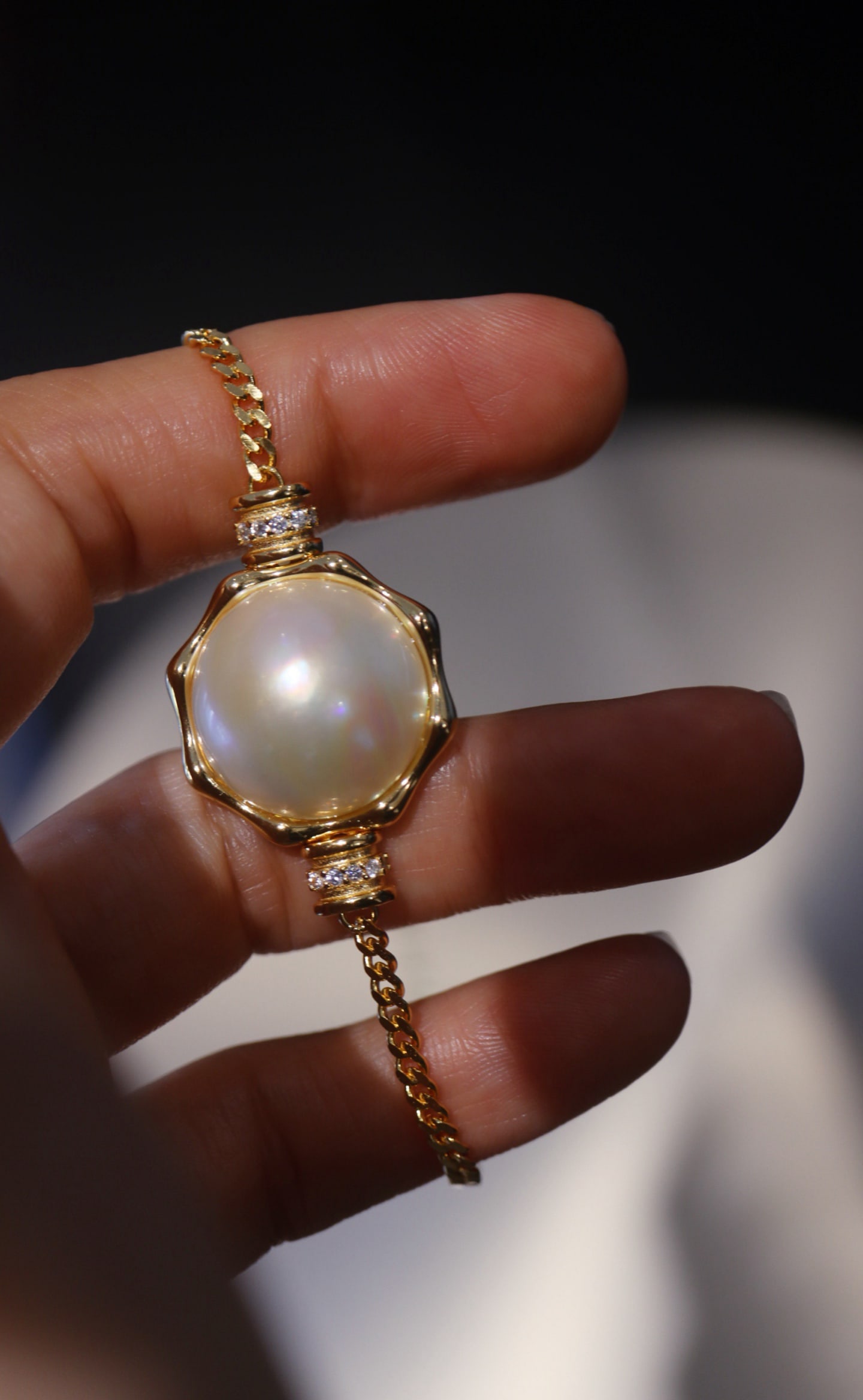 Sterling Silver Large Size Seawater Mabe Bracelet: Title: Sterling Silver Large Size Seawater Mabe Bracelet Description: This bracelet features large size seawater Mabe pearls, showcasing understated luxury. Set in sterling silver, it is simple yet el
