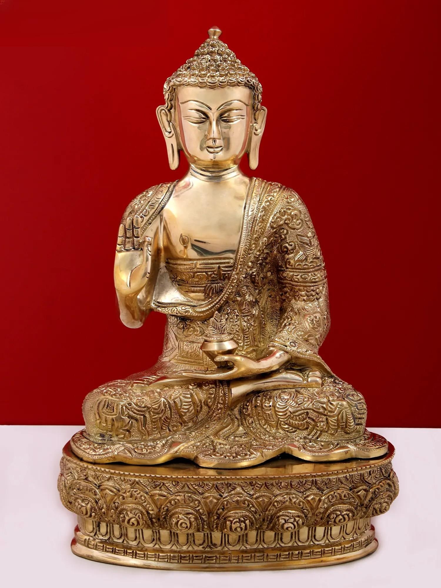 12" Fine Blessing Buddha Brass Sculpture | Buddhist Statue: Description: See It In Your Home Invite serenity and spiritual elegance into your space with our blessing Buddha Statue in Brass. This exquisite statue, meticulously crafted from high-quality brass,