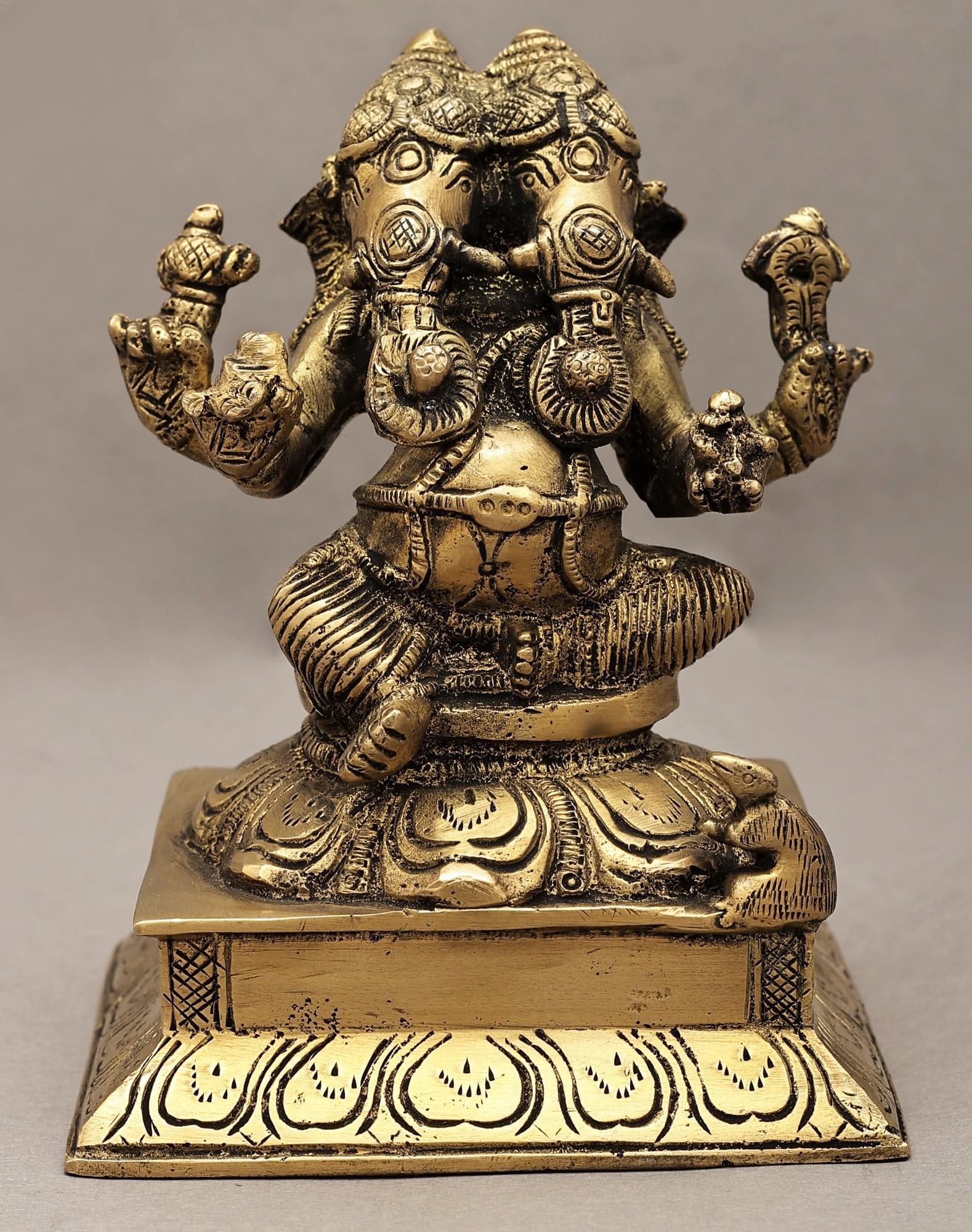 5" Two-Headed Ganesha Brass Statue (Rare Presentation) | Handmade | Made in India: Description: Explore the unique and rare presentation of Dwi Mukhi in this handcrafted brass sculpture, meticulously made in India. Ganesha , the remover of obstacles, is a beloved deity in Hindu