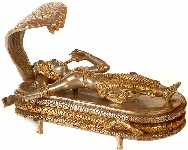 9" Lord Vishnu in Yoga Nidra | Handmade Brass Statue | Made in India: Description: Vishnu stands as the eternal essence of the universe, representing the very soul of creation and the sacred principles of dharma, or righteousness. Ananta Shesha , often portrayed as a