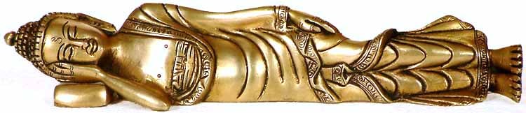 10" Buddha Idol in Maha Parinirvana in Brass | Handmade | Made in India: Description: See It In Your Home Cast from the finest brass, this sculpture exudes a timeless elegance that enhances every intricately carved detail. The serene expression on Buddha's face as he lies