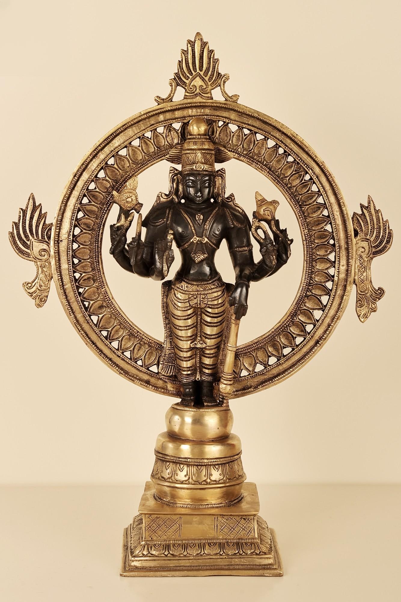 Eight-Armed Lord Vishnu Statue with Chakra at Back: Description: See It In Your Home The leading deity of the efficacious Sudarshana Homa, Lord Sudarshana, is one of the manifestations of Lord Vishnu who can be seen holding Sudarshan chakra , the omnip
