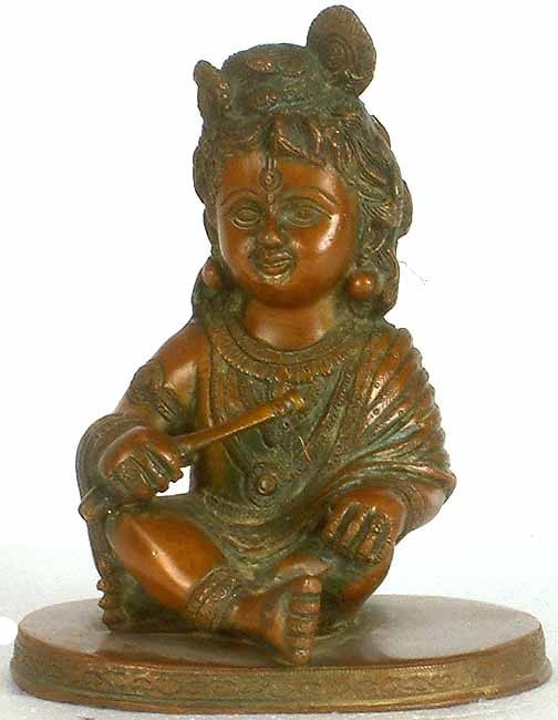 7" Baby Krishna in Brass | Handmade | Made In India: Description: 7" Baby Krishna in Brass | Handmade | Made In India itemcode: EU69 Reserve: $192 Shipping: Domestic: Shipping rates are determined by destination International: Foreign shipping rates