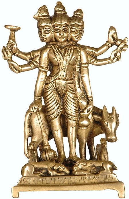6" Adiguru Lord Dattatreya Brass Idol | Handmade Religious Figurine: Description: Lord Dattatreya is the presiding deity over yoga. He is a Trimurti avatar, a manifestation of the Brahma-Vishnu-Shiva trinity, who traverses the mighty peaks and the gentle foothills of