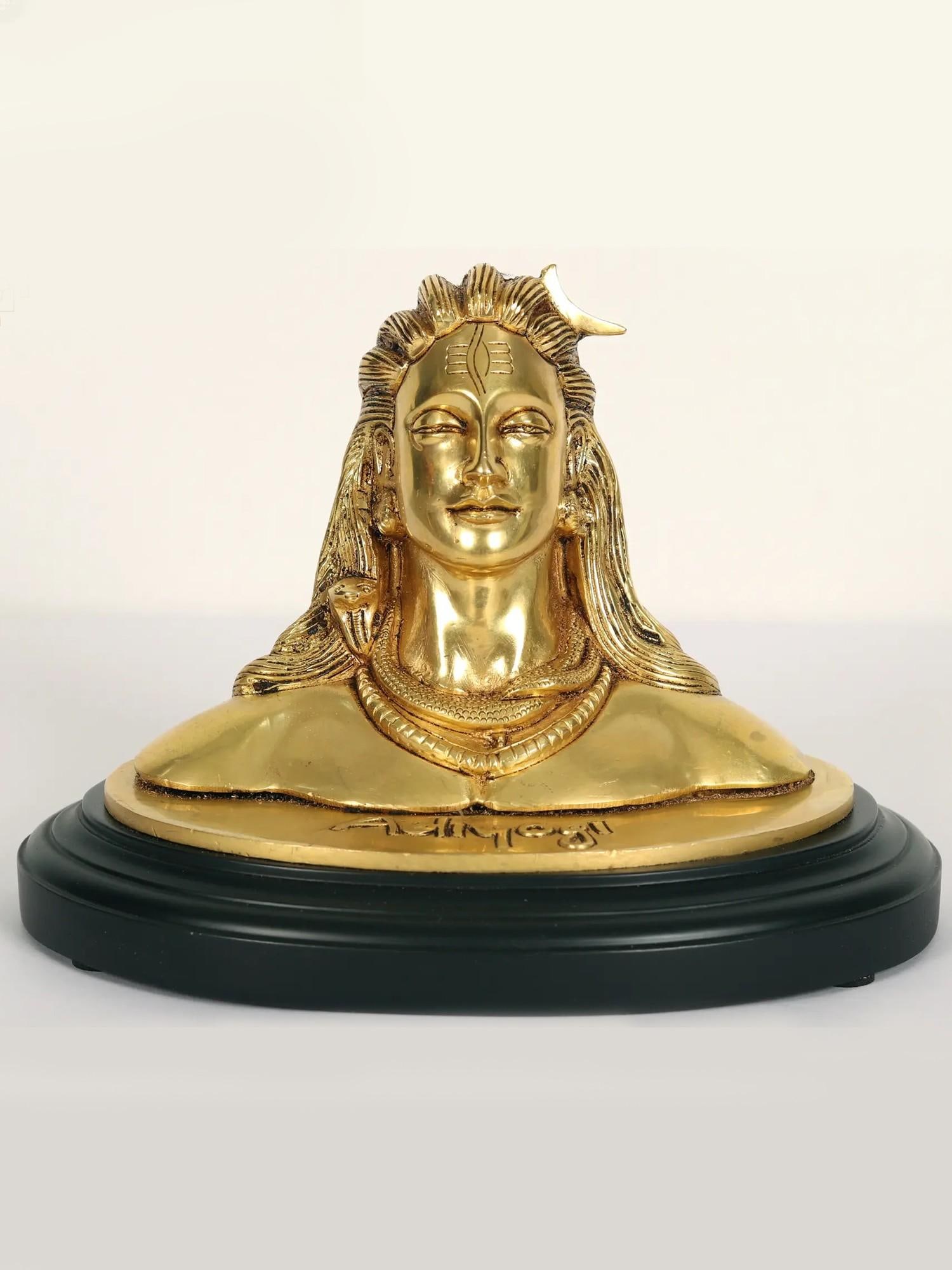 8" Brass Adiyogi Shiva Bust on Wood Base: Description: 8" Brass Adiyogi Shiva Bust on Wood Base itemcode: LDC775 Reserve: $140 Shipping: Domestic: Shipping rates are determined by destination International: Foreign shipping rates are determin