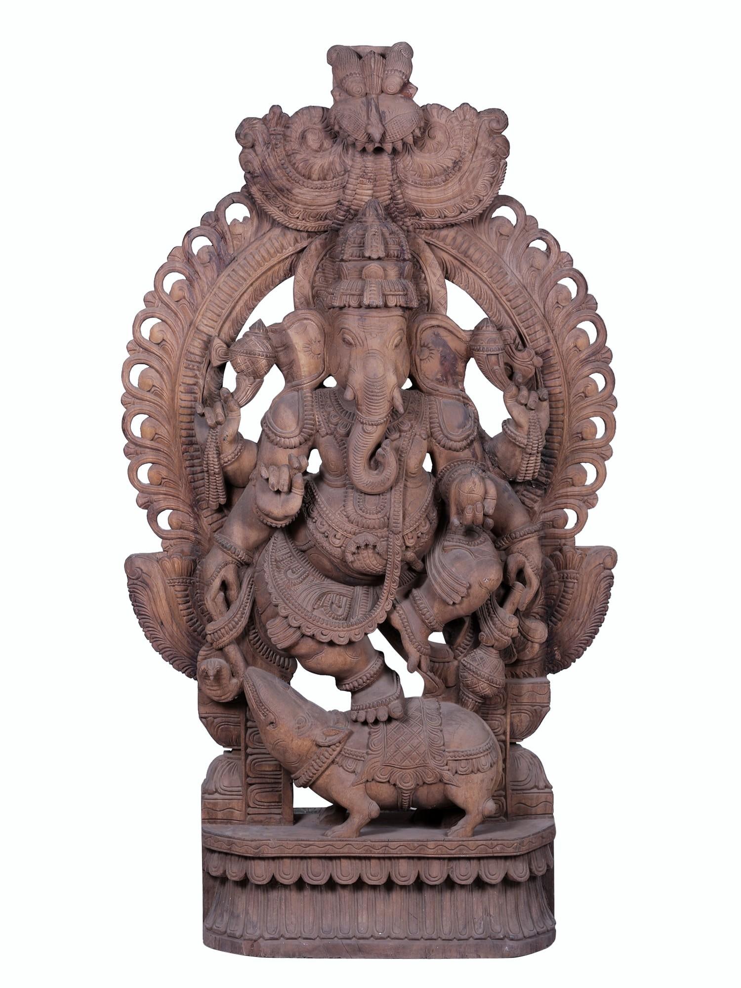 60" Large Wooden Lord Ganesha Statue on Rat with Kirtimukha Throne: Description: “Natetara atibheekaram navodita Arkabhaasvaram, namatsuraari nirjaram nataadhika aapaduddharam, Suraishvaram nidheesvaram Gajeshvaram Ganeshwaram, Maheshvaram tamaashraye Paraatparam