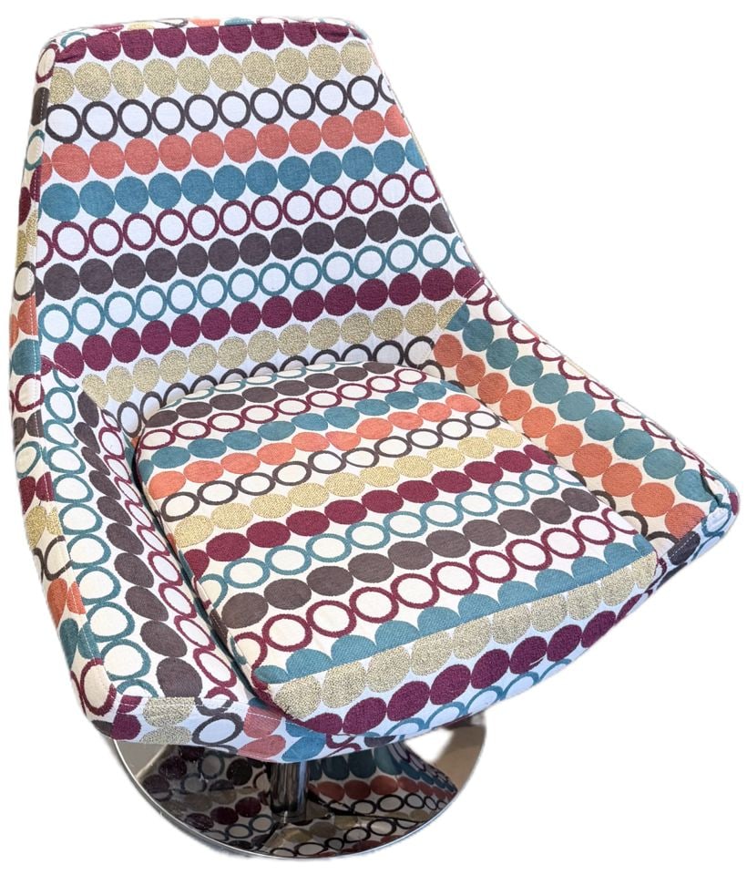 1 Chair/ 2 Personalities. MCM swivel accent side chair w/ heavy chrome base & vibrant 70s fabric. - 3
