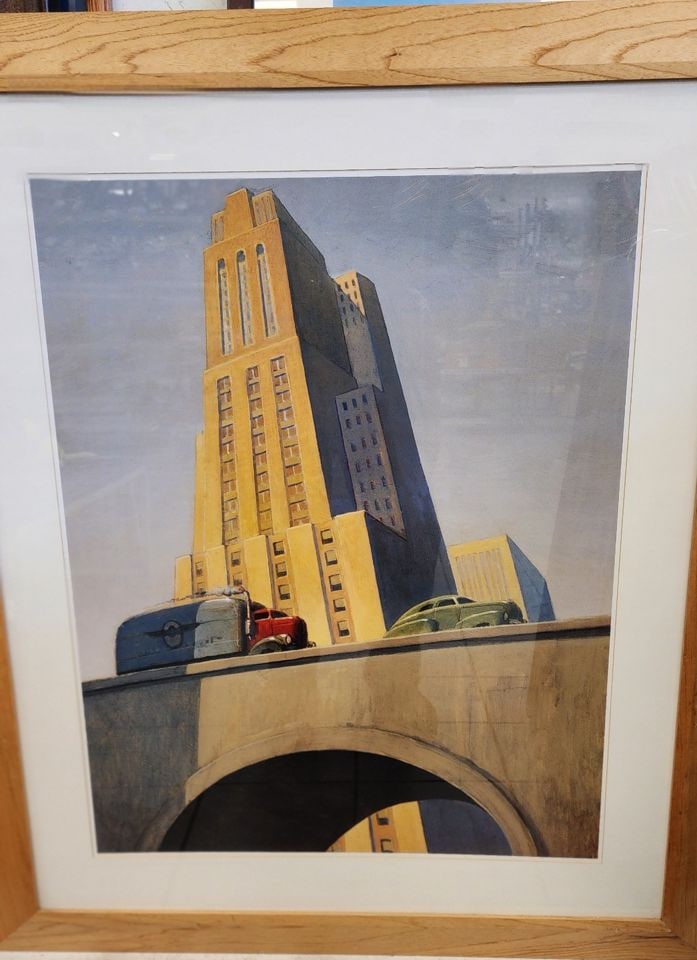 Rare Vintage iconic Robert LaDuke 40 x 48 impressively framed print titled "Scraper".: Scraper by American artist Robert LaDuke is an exceptional work. The artwork depicts a tall, Art Deco-style skyscraper with a truck and a car on an elevated road in the foreground. The artist, Robert