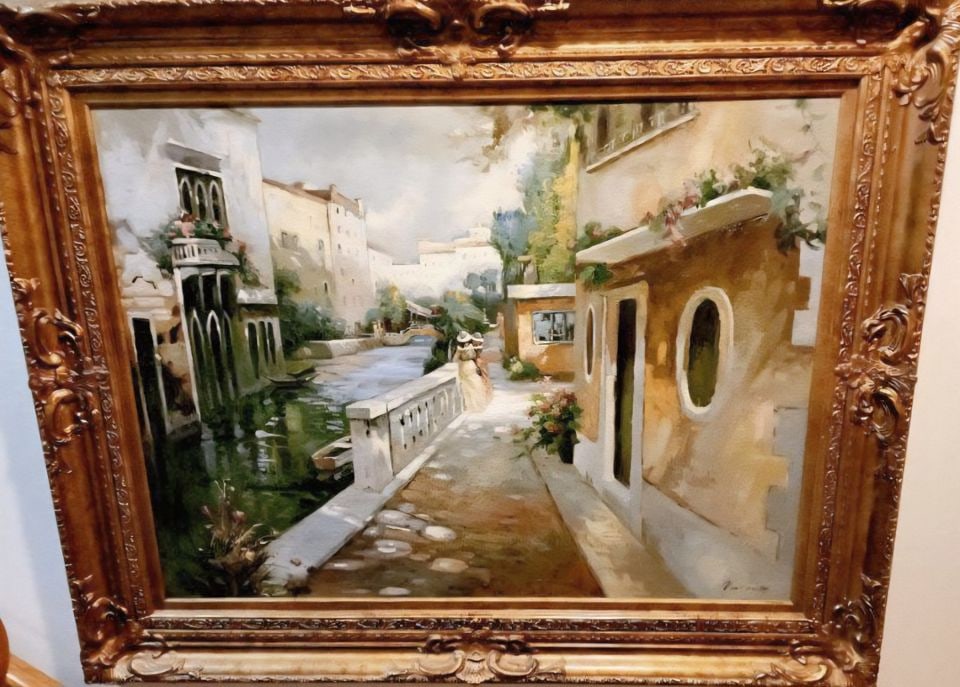 Vincente large masterful vintage impressionist oil painting of turn-of-the century European village.: This is quite an extraordinary mid to early 20th century work. Signed by the artist and housed in a magnificent gold painted gilded frame. A wonderful collector item and statement piece for your
