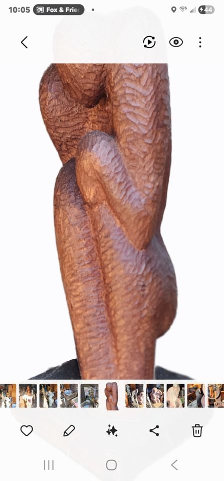 Mid-century hand carved biomorphic brutalist wood sculpture offering a dual interpretation of one or